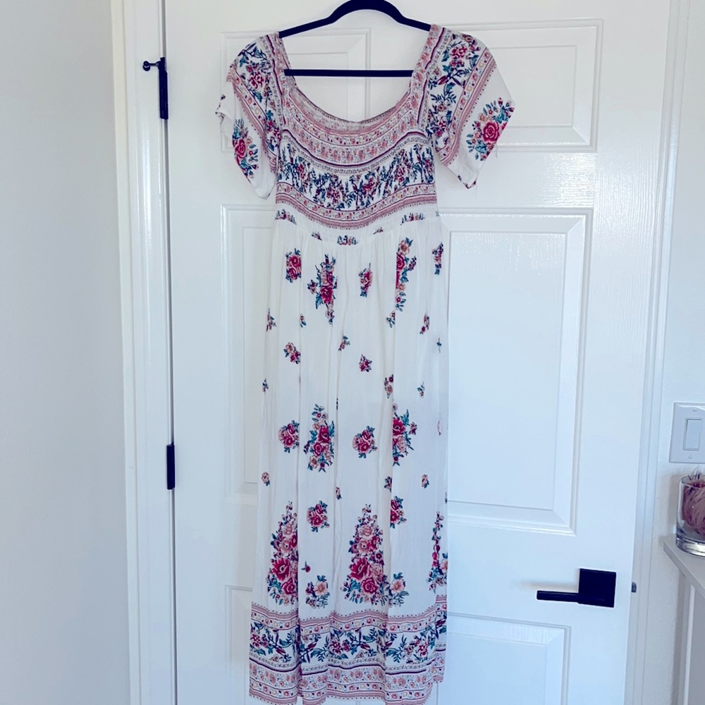Off the shoulder cute Spanish style dress.